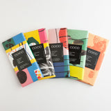 This festive collection contains five of Coco Chocolatier's most popular dark chocolate bars.  Product Details:  Includes five dark chocolate bars: Cold Brew Coffee, Isle of Skye Sea Salt, Gin & Tonic, Passion Fruit and Columbian 61%.