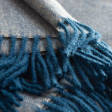 100% baby alpaca blanket: Rich shades of teal and sandstone are woven into a herringbone-patterned blanket produced with the finest grade of alpaca. 71" length x 51" width. Made in Peru.