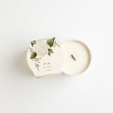 No. 01 Ceramic Botanical Candle by Simply Curated is a delicate blend of honeysuckle, plum and rose, with notes of pink jasmine, gardenia, and lily of the valley. Soy wax with a clean burning wooden wick. 5 oz., 2.75" x 2.75." Burn time: 30 hours.