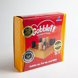 Gobblet! is a fast-paced game that is easy to learn. The objective is to get four pieces in a row, which is surprisingly challenging as your opponent can claim your spot by covering your piece with a larger one. 