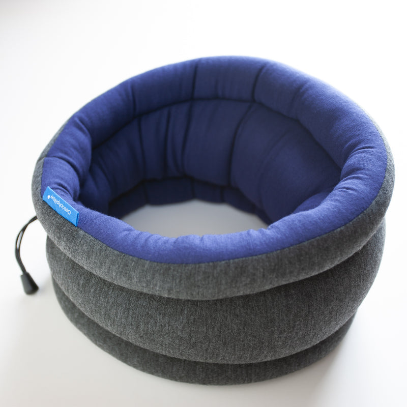 "Light Versatile Pillow" by Ostrich Pillow: a magical little pillow that provides comfort in myriad ways. Can be used as a head or neck pillow, an eye mask, or to make any challenging sleeping position more comfortable. Perfect for travel. Reversible and adjustable.