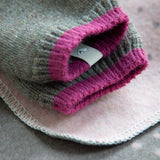 There is a cute little silver heart on a hidden label inside the socks.