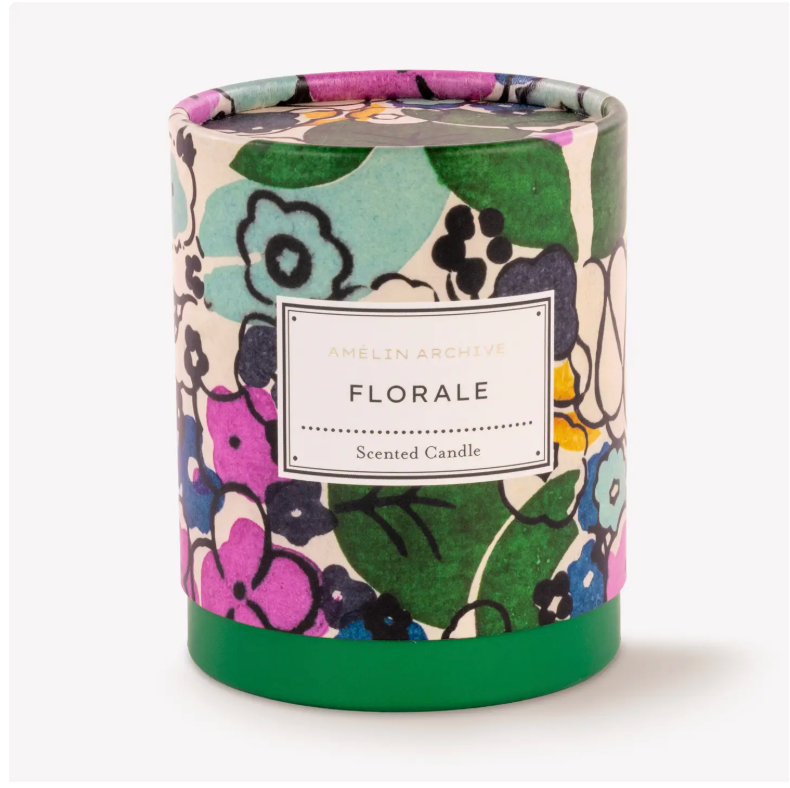 Floral-patterned packaging contains a scented candle from Amelin Archive. 