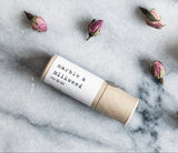 Marble & Milkweed rosy lip tint:  A hand-crafted blend of organic ingredients that leaves lips smelling like a rose. Compostable paper push-up tube. Made in the USA.