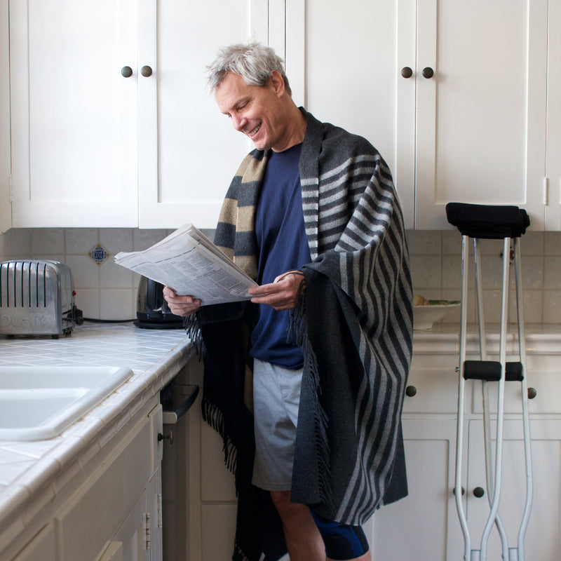 100% Baby Alpaca Blanket: The striking combination of charcoal, camel and ivory wool is woven into a two-sided stripe pattern. This luxuriously soft, hypoallergenic throw is produced with the finest grade of alpaca. 71 in. length x 51 in. width. Made in Peru.